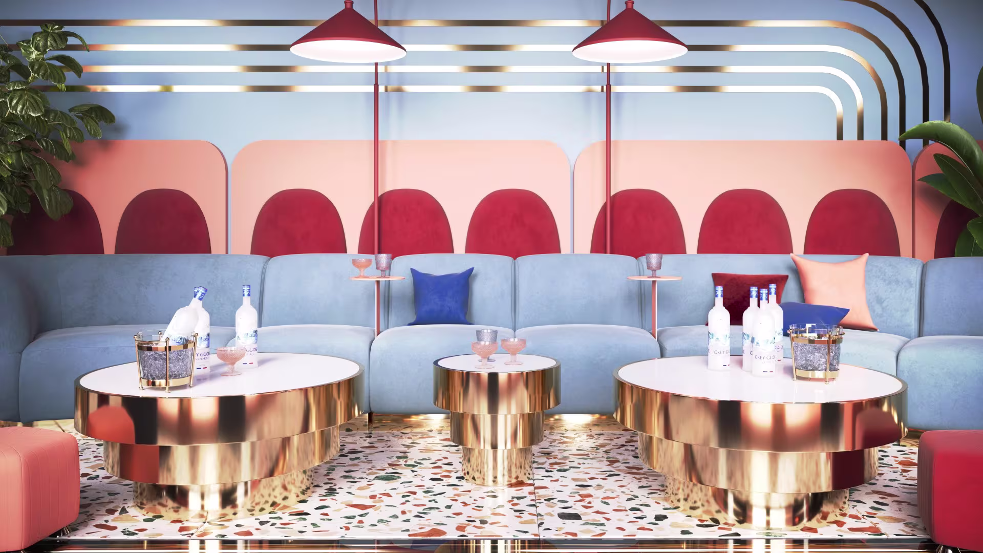 Modern indoor lounge setup with colorful sofas, round tables, and contemporary event furniture rentals