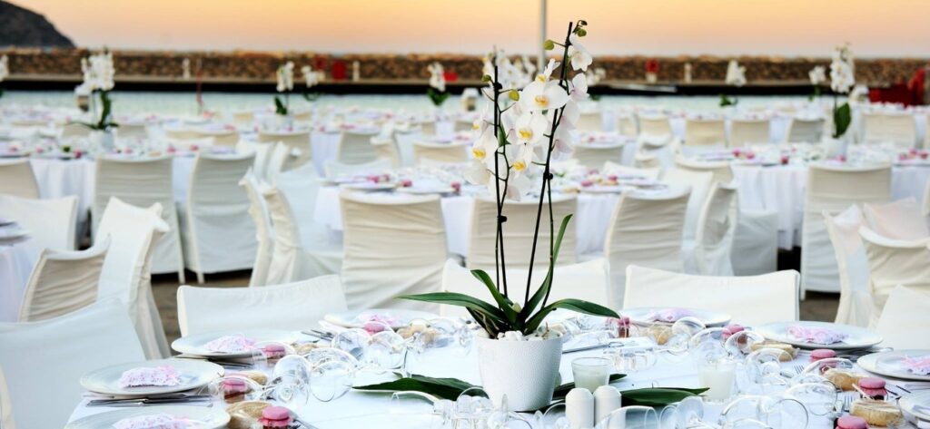 Coastal event rental inspiration with light colors and outdoor table settings